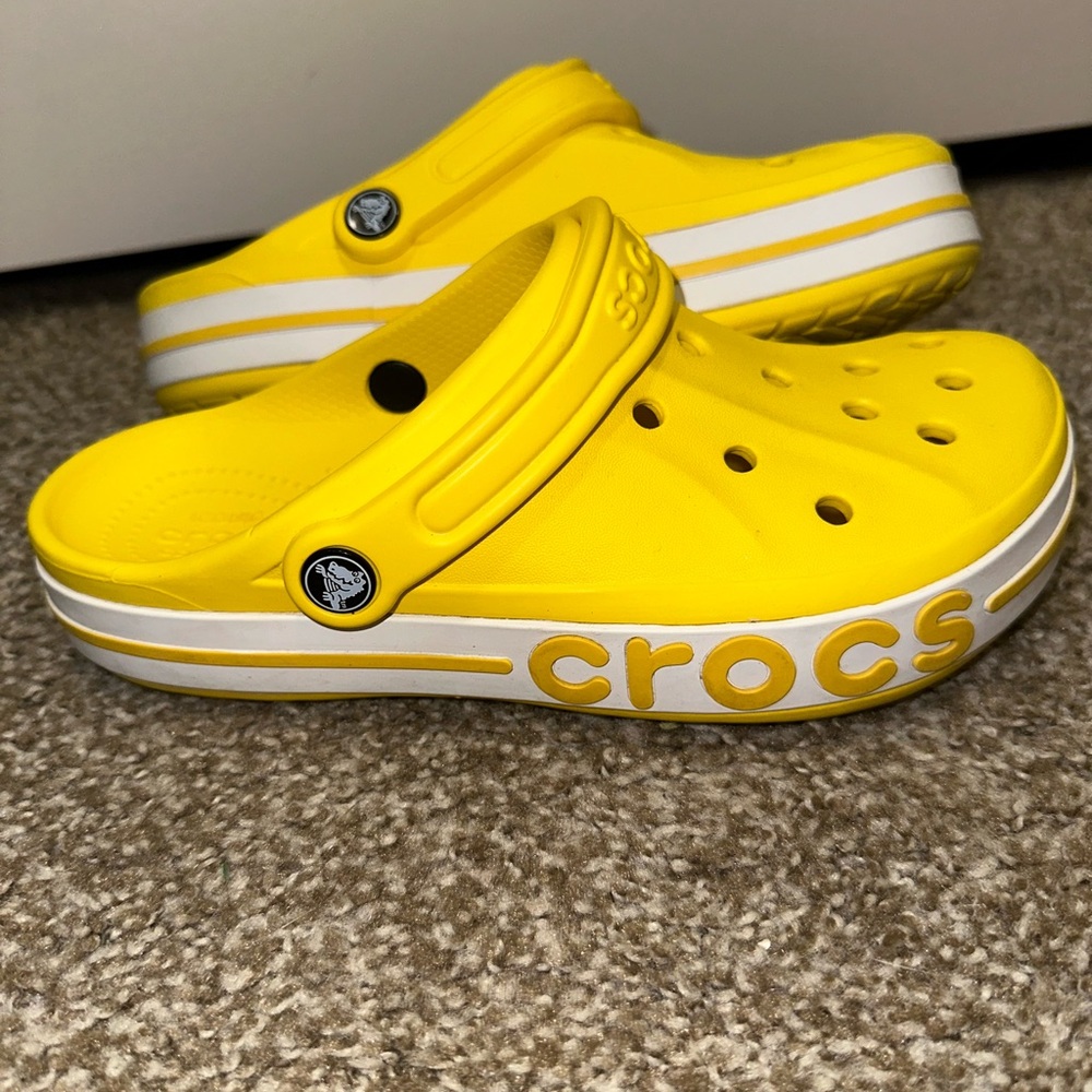 CROCS Yellow Clogs with Iconic Perforated Design